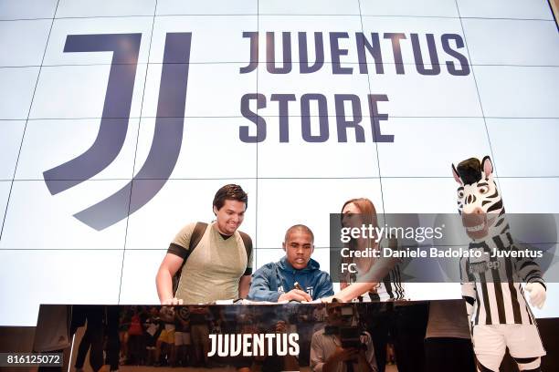 Douglas Costa of Juventus poses for a picture on July 17, 2017 in Turin, Italy.