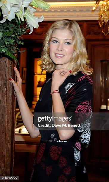 Actress Rosamund Pike poses to launch the the Cartier Love Charity Bracelet in support of Action Against Hunger, at Cartier New Bond Street on June...