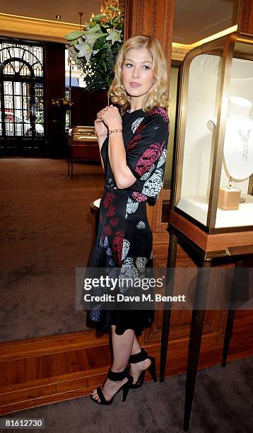 Actress Rosamund Pike poses to launch the the Cartier Love Charity Bracelet in support of Action Against Hunger, at Cartier New Bond Street on June...