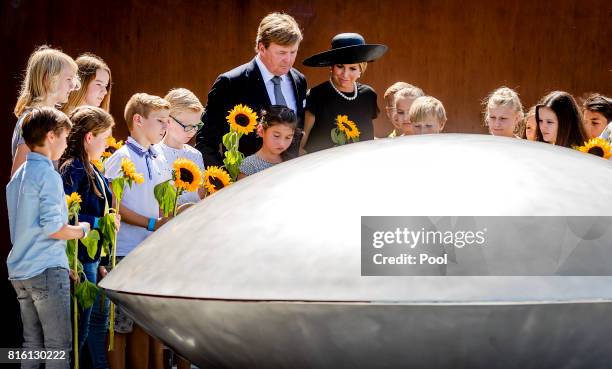 King Willem-Alexander of The Netherlands and Queen Maxima of The Netherlands attend the MH17 remembrance ceremony and the unveiling of the National...