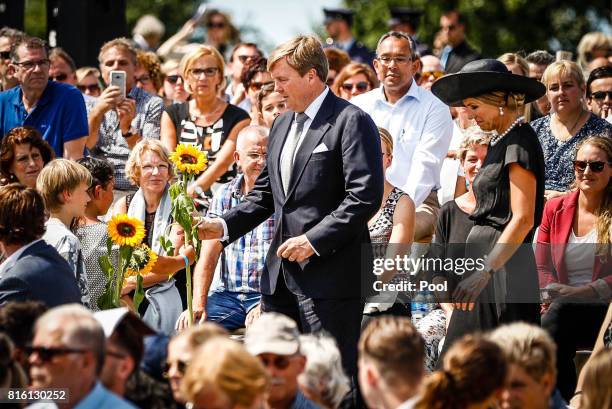 King Willem-Alexander of The Netherlands and Queen Maxima of The Netherlands attend the MH17 remembrance ceremony and the unveiling of the National...