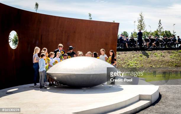 King Willem-Alexander of The Netherlands and Queen Maxima of The Netherlands attend the MH17 remembrance ceremony and the unveiling of the National...