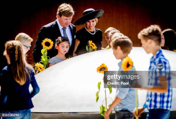 King Willem-Alexander of The Netherlands and Queen Maxima of The Netherlands attend the MH17 remembrance ceremony and the unveiling of the National...