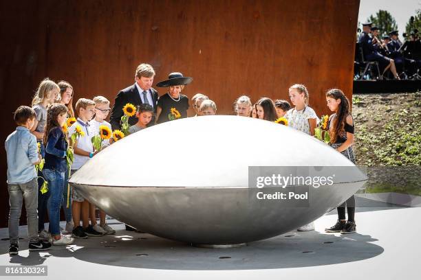 King Willem-Alexander of The Netherlands and Queen Maxima of The Netherlands attend the MH17 remembrance ceremony and the unveiling of the National...