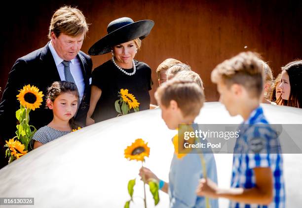 King Willem-Alexander of The Netherlands and Queen Maxima of The Netherlands attend the MH17 remembrance ceremony and the unveiling of the National...