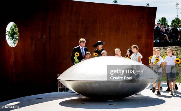 King Willem-Alexander of The Netherlands and Queen Maxima of The Netherlands attend the MH17 remembrance ceremony and the unveiling of the National...