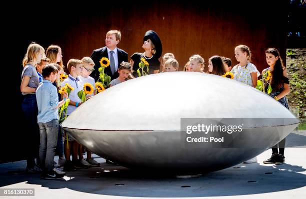 King Willem-Alexander of The Netherlands and Queen Maxima of The Netherlands attend the MH17 remembrance ceremony and the unveiling of the National...