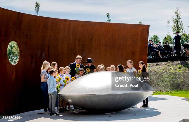 King Willem-Alexander of The Netherlands and Queen Maxima of The Netherlands attend the MH17 remembrance ceremony and the unveiling of the National...