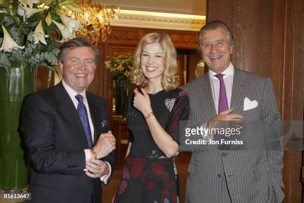 Paul Wilson, Rosamund Pike and Arnaud Bamberger Launche the Cartier Love Charity Braclet in support of action against hunger at Catrier's Bond Street...