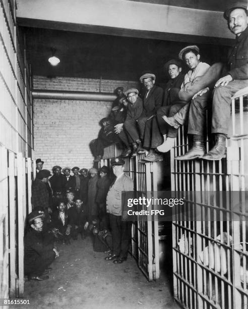 Some of the fifty Middle Eastern men arrested in Canton, Ohio, having been smuggled into the country in New York, circa 1945. They are in prison,...