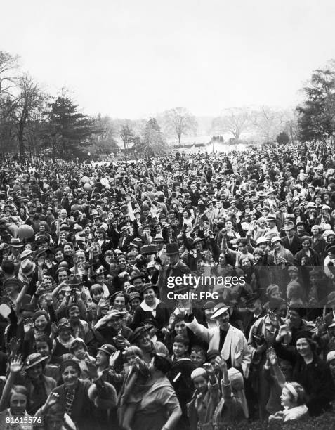 Crowds attend the traditional White House Easter Egg Roll on the South Lawn of the White House in Washington, DC, circa 1935.