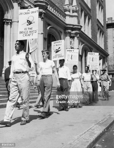 Civil rights activist Bayard Rustin leads other members of the 'Campaign to Resist Military Segregation' picketing registration for America's postwar...