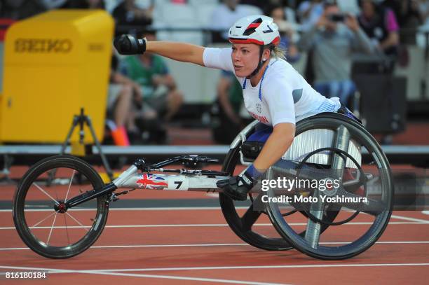 Hannah Cockroft of Great Britain celebrates setting new world record after competing in the Women’s 100m T34 during the IPC World ParaAthletics...