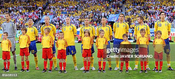 Swedish players Swedish goalkeeper Andreas Isaksson, Swedish forward Henrik Larsson, Swedish defender Petter Hansson, Swedish defender Fredrik Stoor,...