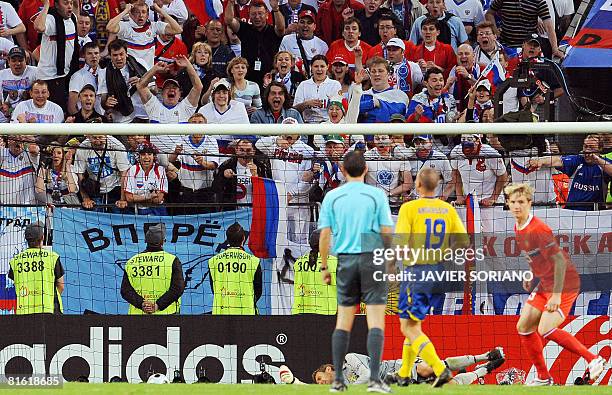 Russian forward Roman Pavlyuchenko celebrates after scoring a goal in front of Swedish goalkeeper Andreas Isaksson during the Euro 2008 Championships...