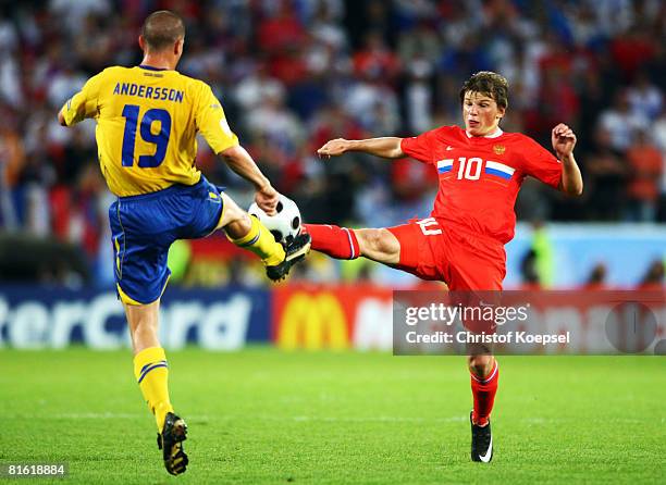 Andrei Arshavin of Russia battles for the ball with Daniel Andersson of Sweden during the UEFA EURO 2008 Group D match between Russia and Sweden at...