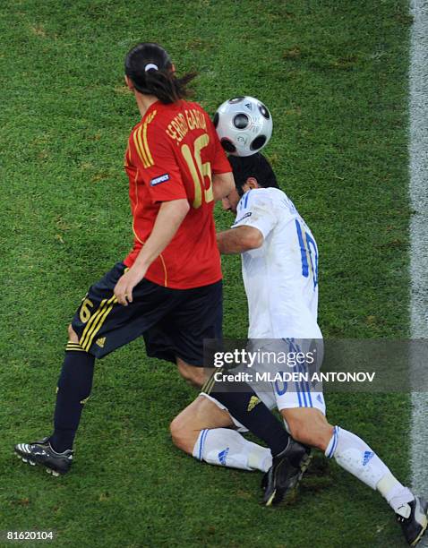 Greek midfielder Georgios Karagounis vies for the ball with Spanish forward Sergio Garcia during the Euro 2008 Championships Group D football match...