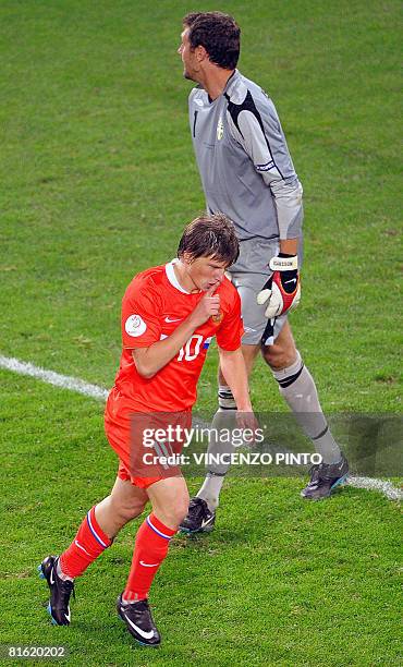 Russian forward Andrei Arshavin celebrates after scoring a goal in front of Swedish goalkeeper Andreas Isaksson during the Euro 2008 Championships...