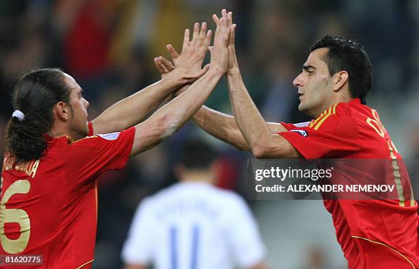 Spanish forward Daniel Guiza and Spanish forward Sergio Garcia celebrate a goal by teammate Ruben de La Red during the Euro 2008 Championships Group...