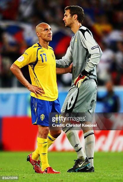 Henrik Larsson and goalkeeper Andreas Isaksson of Sweden look dejected after defeat in the UEFA EURO 2008 Group D match between Russia and Sweden at...