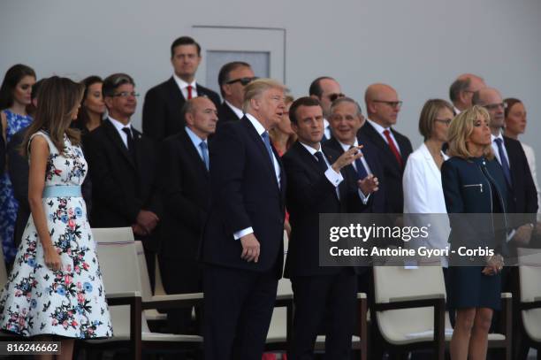 President Donald Trump and his wife Melania Trump, French President Emmanuel Macron and his wife Brigitte Trogneux during the traditional Bastille...