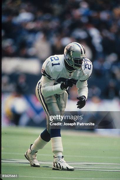 Defensive back Deion Sanders of the Dallas Cowboys lines up in pass coverage against the Philadelphia Eagles at Texas Stadium in the 1995 NFC...