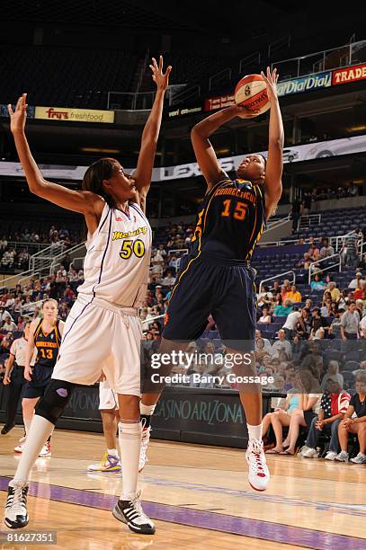 Asjha Jones of the Connecticut Sun shoots against Tangela Smith of the Phoenix Mercury at U.S. Airways Center June 18, 2008 in Phoenix, Arizona. NOTE...