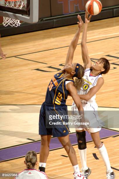 Tangela Smith of the Phoenix Mercury grabs a rebound against Asjha Jones of the Connecticut Sun at U.S. Airways Center June 18, 2008 in Phoenix,...