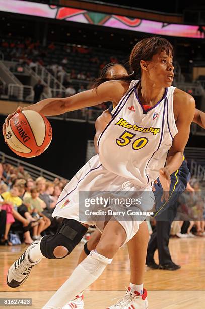 Tangela Smith of the Phoenix Mercury drives to the basket against the Connecticut Sun at U.S. Airways Center June 18, 2008 in Phoenix, Arizona. NOTE...