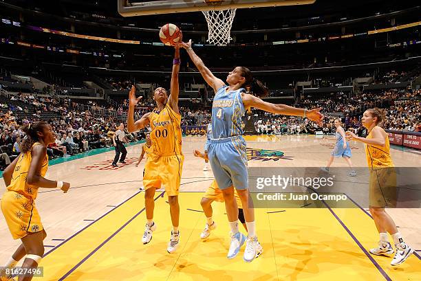 Murriel Page of the Los Angeles Sparks battles for the ball during the game against Candice Dupree of the Chicago Sky on June 18, 2008 at Staples...