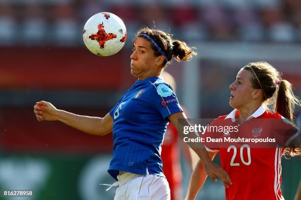 Marta Carissimi of Italy and Margarita Chernomyrdina of Russia compete for the ball during the Group B match between Italy and Russia during the UEFA...