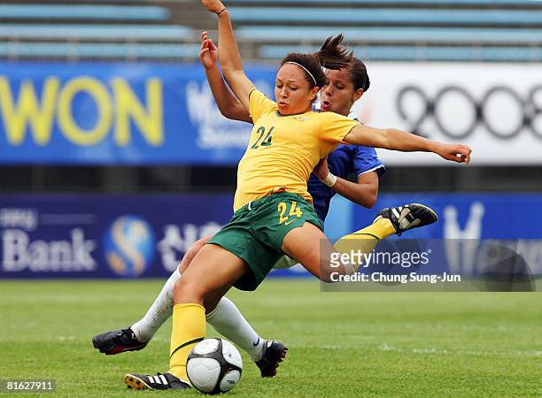 Kyah Simon of Australia is challenged by Erika Santos of Brazil during the 2008 Queen Peace Cup match between Australia and Brazil at the Suwon...