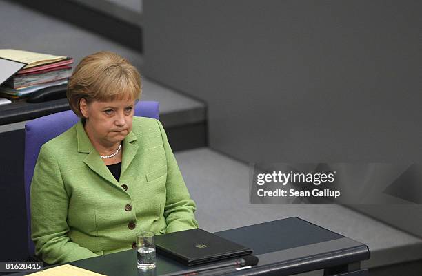 German Chancellor Angela Merkel sits at her seat in the Bundestag prior to giving a government declaration on the future of the European Union's...