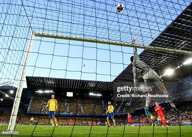Andreas Isaksson of Sweden tips the ball over the crossbar during the UEFA EURO 2008 Group D match between Russia and Sweden at Stadion Tivoli Neu on...