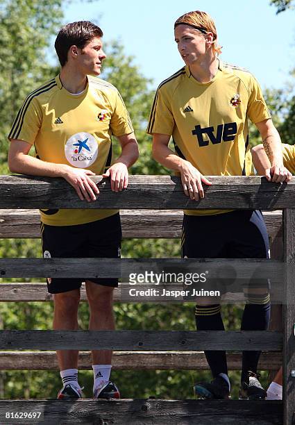 Fernando Torres of Spain chats with his teammate Xabi Alonso during a light training session on June 19, 2008 in Neustift im Stubaital, Austria....