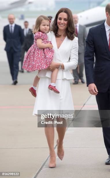 Prince William, Duke of Cambridge and Catherine, Duchess of Cambridge with their children Prince George and Princess Charlotte arrive at Warsaw...