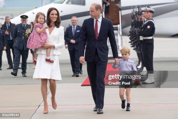 Prince William, Duke of Cambridge and Catherine, Duchess of Cambridge with their children Prince George and Princess Charlotte arrive at Warsaw...