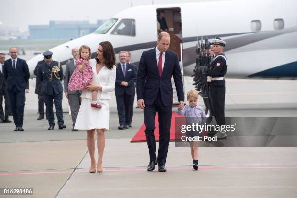 Prince William, Duke of Cambridge and Catherine, Duchess of Cambridge with their children Prince George and Princess Charlotte arrive at Warsaw...