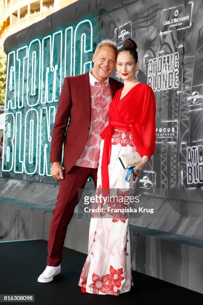 Uwe Fahrenkrog-Petersen and his partner Christin Dechant attend the 'Atomic Blonde' - World Premiere at Stage Theater on July 17, 2017 in Berlin,...