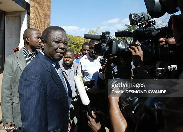 Zimbabwean Movement for Democratic Change President Morgan Tsvangirai speaks to the press on June 19, 2008 after attending the bail application case...