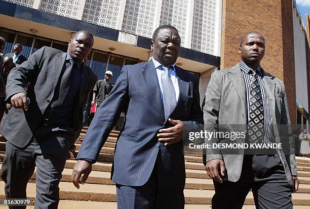 Zimbabwean Movement for Democratic Change President Morgan Tsvangirai walks out the Harare Magistrate's court on June 19, 2008 after attending the...