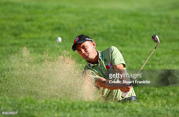 Markus Brier of Austria plays his bunker shot on the 10th hole during the first round of The BMW International Open Golf at The Munich North...