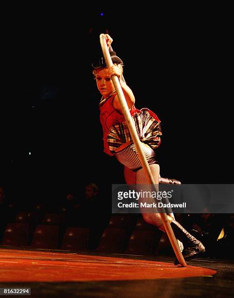 Acrobat Nicci Wilks performs with a "Rim" during the media call for the Circus Oz "30th Birthday Bash" at Birrarung Marr on June 19, 2008 in...