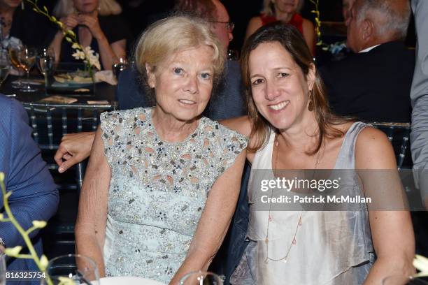 Alice Aycock and Robin Pogrebin attend the Midsummer Party 2017 at Parrish Art Museum on July 15, 2017 in Water Mill, New York.