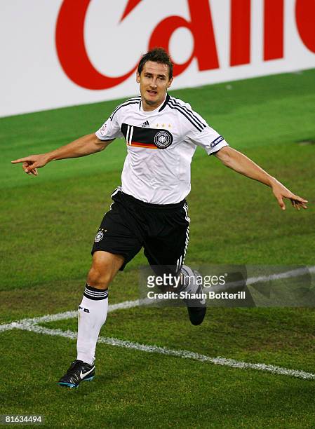 Miroslav Klose of Germany celebrates after scoring his teams second goal during the UEFA EURO 2008 Quarter Final match between Portugal and Germany...