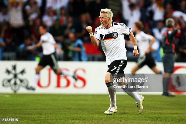 Bastian Schweinsteiger of Germany celebrates after his team mate Miroslav Klose scored the second goal during the UEFA EURO 2008 Quarter Final match...