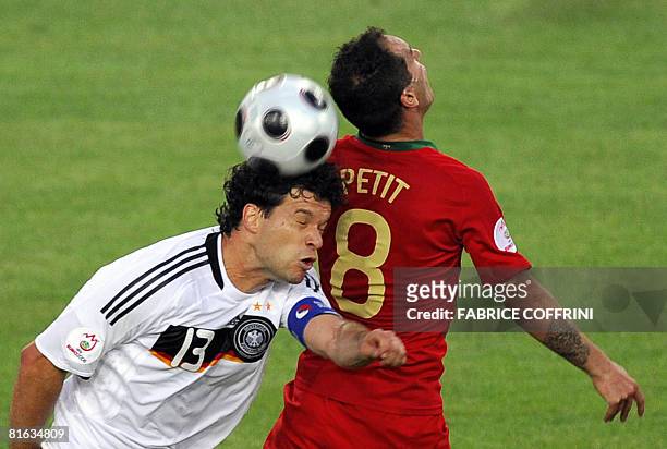 German midfielder Michael Ballack heads the ball next to Portuguese midfielder Petit during the Euro 2008 Championships quarter-final football match...