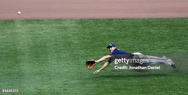 Ryan Braun of the Milwaukee Brewers dives for a ball hit by Lyle Overbay of the Toronto Blue Jays in the 8th inning on June 19, 2008 at Miller Park...