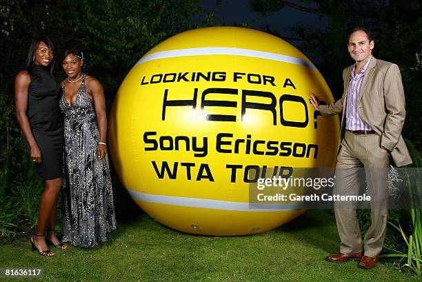 Tennis players Venus Williams and Serena Williams pose with Sony Ericsson WTA Tour CEO Larry Scott during the Sony Ericsson WTA Tour pre-Wimbledon...