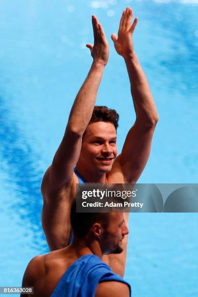 Patrick Hausding and Sascha Klein of Germany celebrate after winning the bronze medal during the Men's Diving 10M Synchro Platform final on day four...